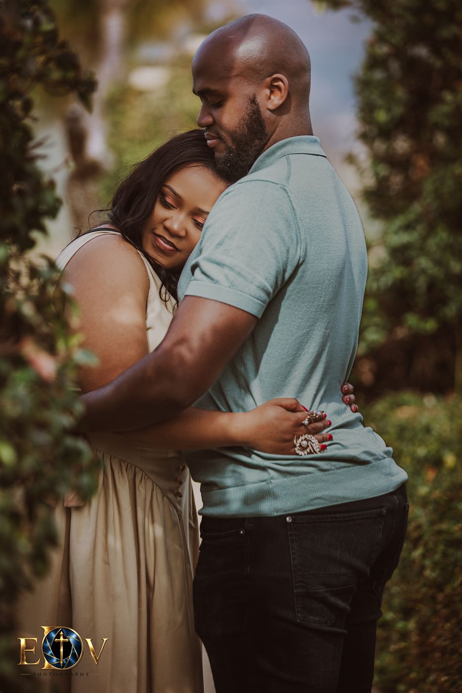 Couple embracing in a garden at a Cape Winelands wine estate